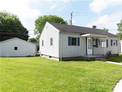 View of the 2 car garage. In town living in this quiet cul-de-sac off Market St.