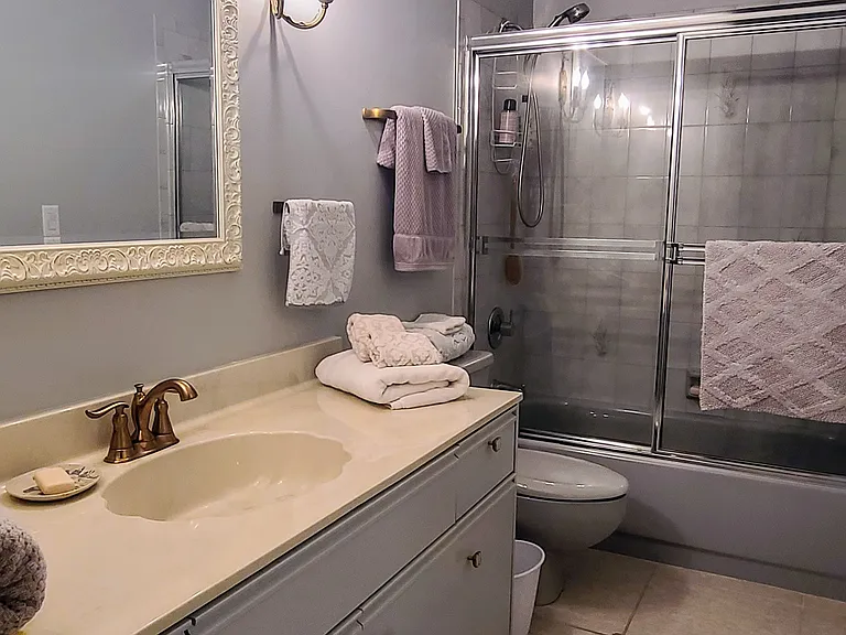 Large mirror with good lighting and plenty of storage