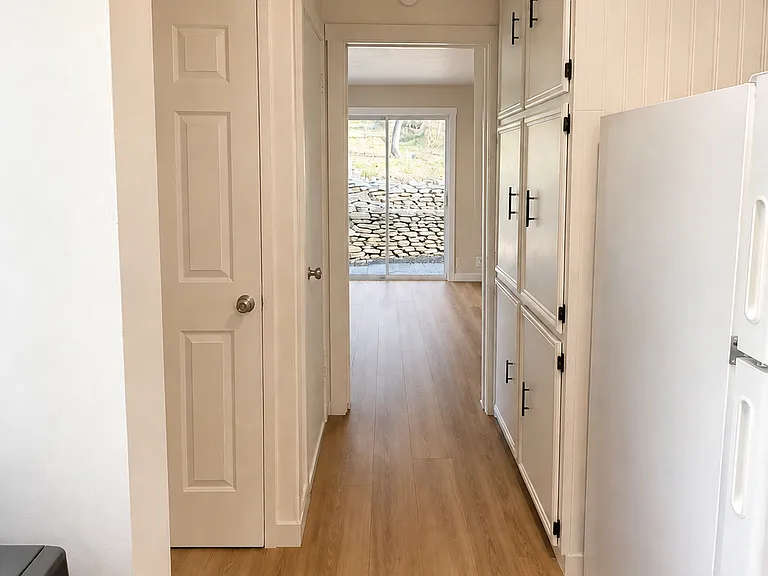 Hallway to downstairs bedroom