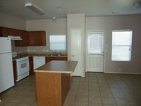 Island kitchen and dining area