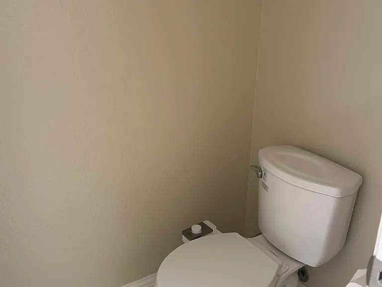 Attached bathroom in downstairs bedroom, freshly painted interiors