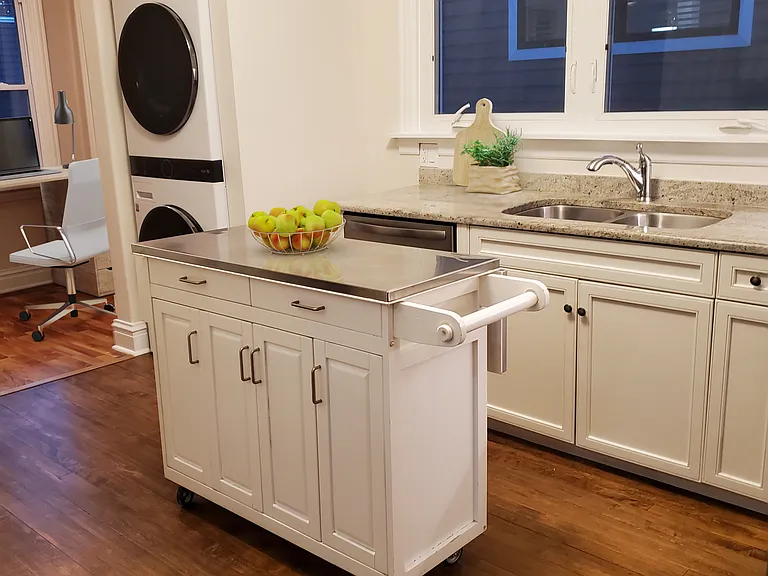 Renovated kitchen with floating island, granite counters, SS appliances, TOP OF THE LINE LG WASHER/DRYER