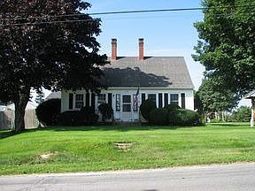 Period charm with central chimneys