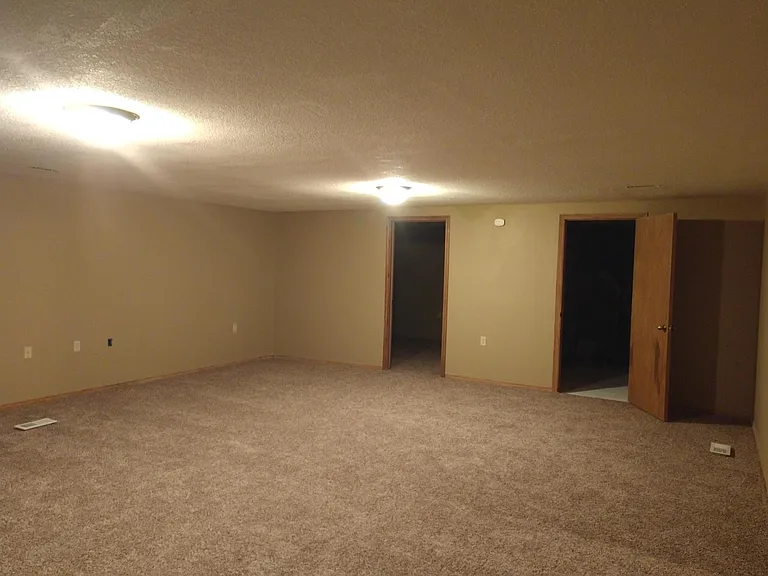 Rec Room Showing Door to Office and Door to Bathroom