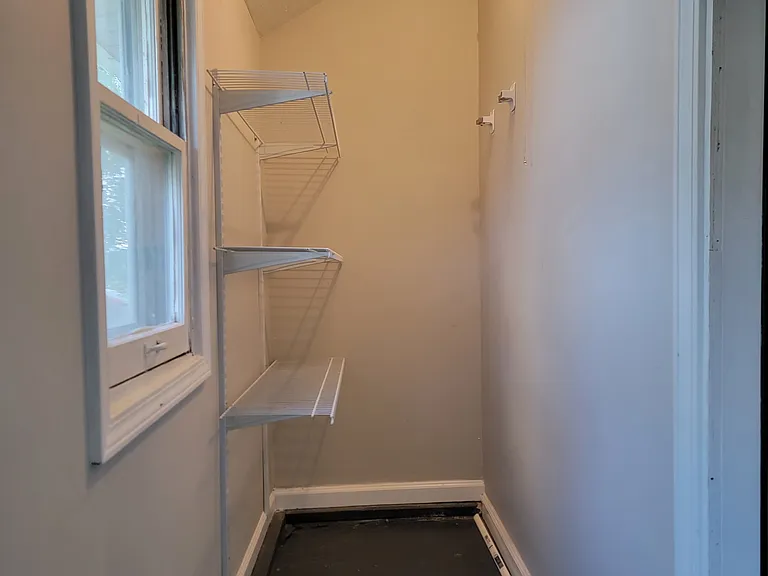 Pantry or storage area at side entrance