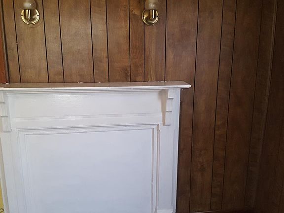 Beautiful wood paneling and fireplace