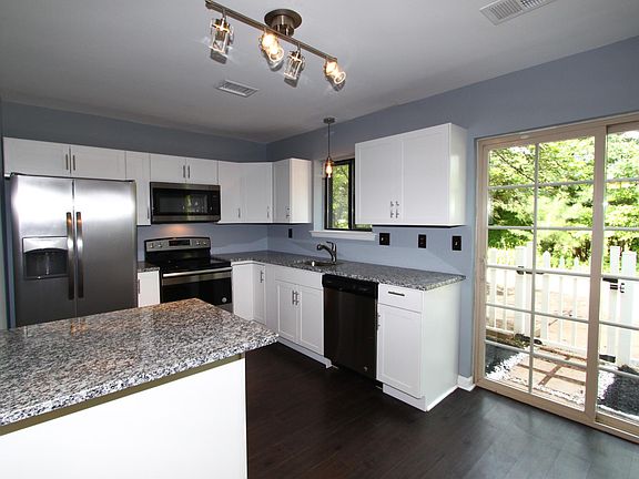 Kitchen with sliding door