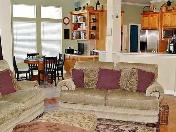 VIEW FROM THE DEN INTO THE KITCHEN