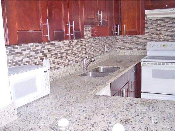 5th image of 9481 Evergreen Pl APT 404