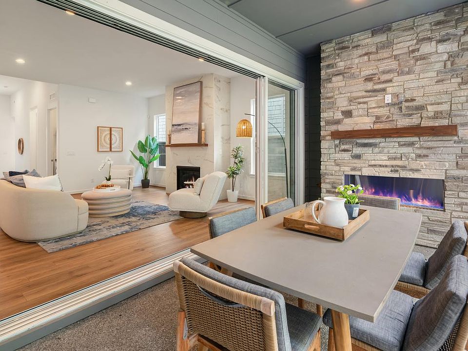 Seamless indoor-outdoor living through expansive multi-panel stacking doors