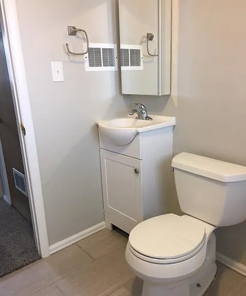 Lower level 1/2 bath plus laundry room