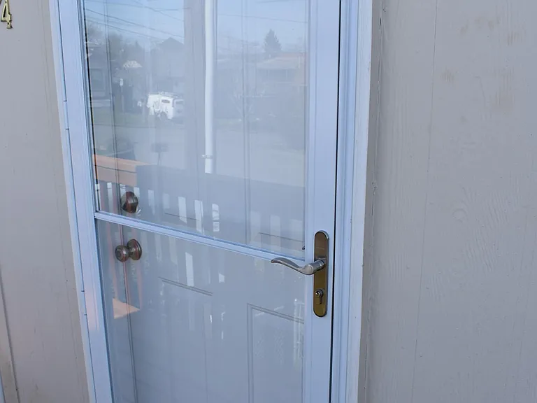 Back storm door.