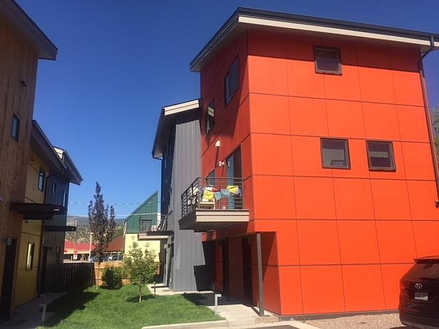 Red unit on right is available. All three stories of the property.