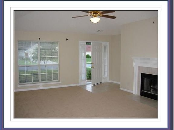 Living room w/ fireplace