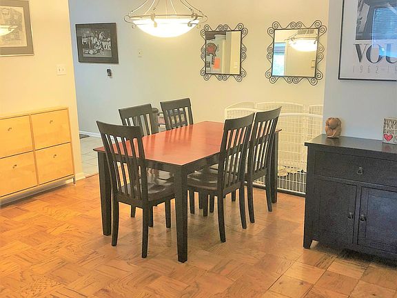 Spacious dining area fits a table for six