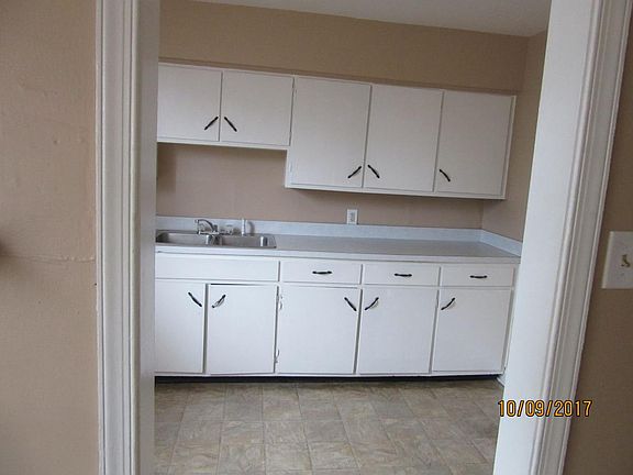 from the dining room into the kitchen