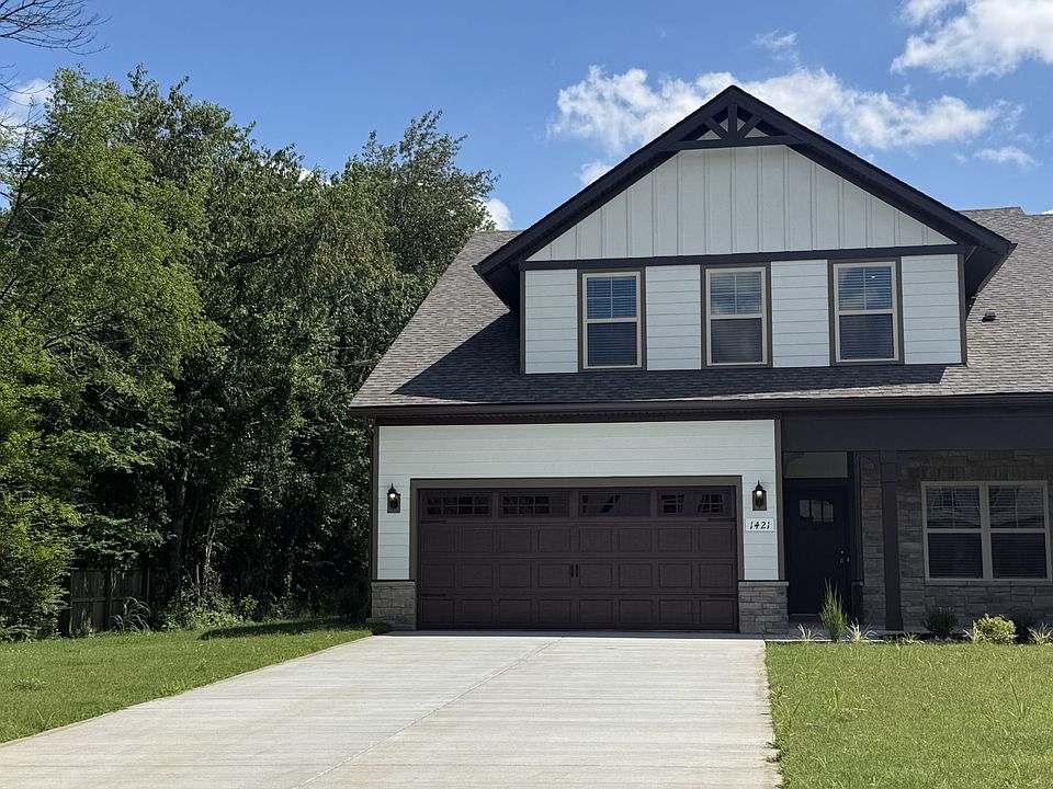 File photo NEW End unit 3 3, 2 car, 2 bedrms down 2 bath, 1 bedrm bath up, great rm kitchen, covere