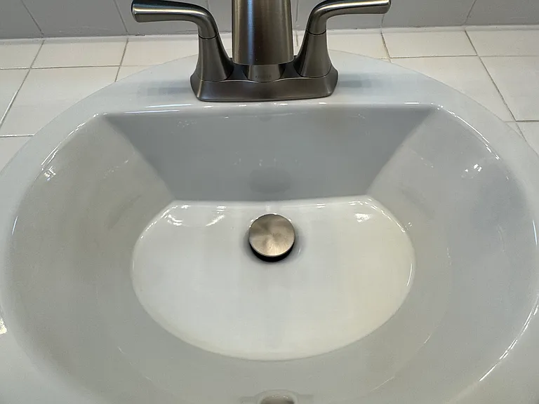 New Kohler fixtures throughout