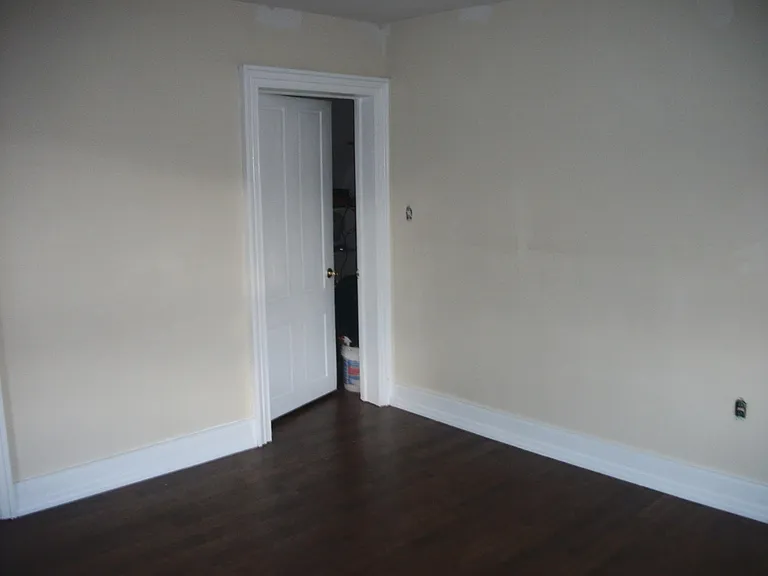 Door from bedroom to living room.