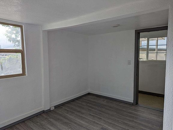 Dining Room Area with access to Enclosed Back Porch with W/D Hookup