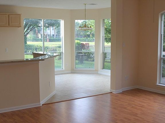OK, here we go.  New laminate wood flooring in the family area, new Travitine over sized tile in the kitchen and the breakfast, family area and kitchen has the waterfront view.