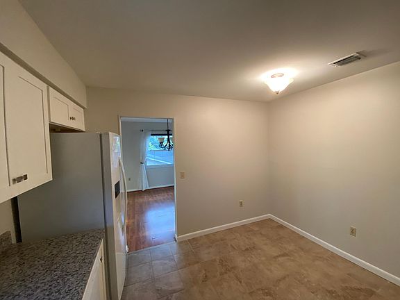 Kitchen is eat in kitchen with ample space.