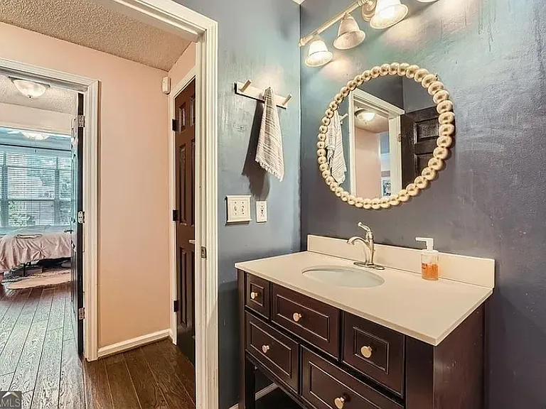 Good lighting and plenty of storage space in and below vanity.