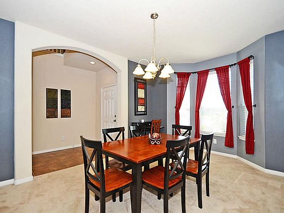 Large dining room with warm colors