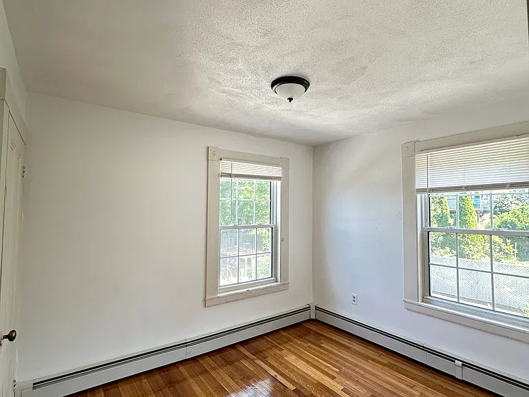 Comfortable second bedroom with closet storage