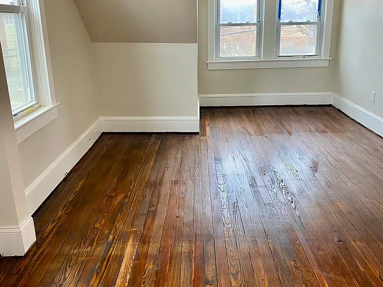 (second floor)right side bedroom, hardwood floors, 4 windows, full wall to wall closet, LED lighting.
