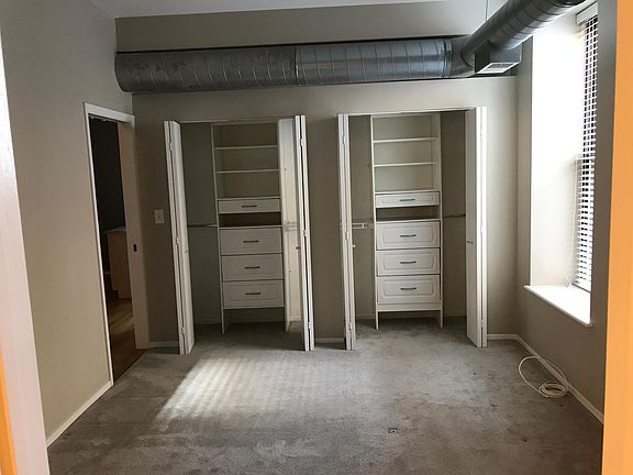 Good size master bedroom with dual closets with closet organizers.