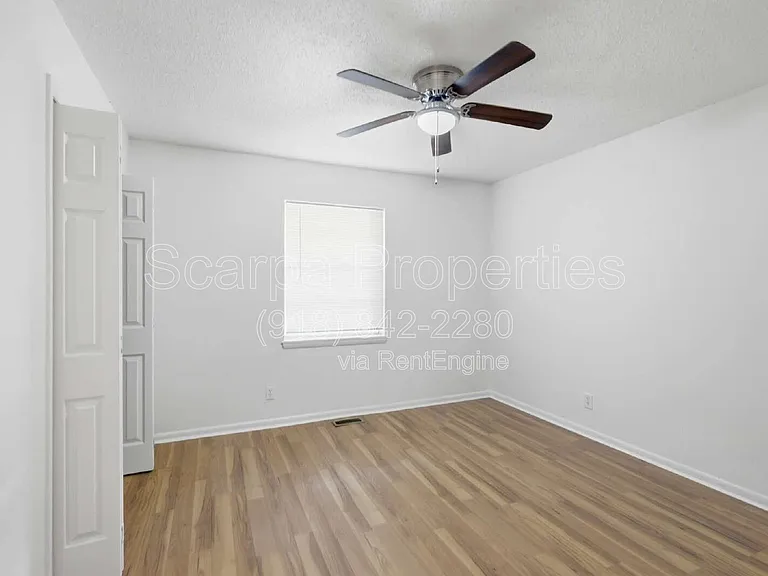 313 E Woodrow Pl — Photo 21