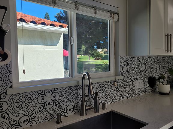 Kitchen window looks over the green belt