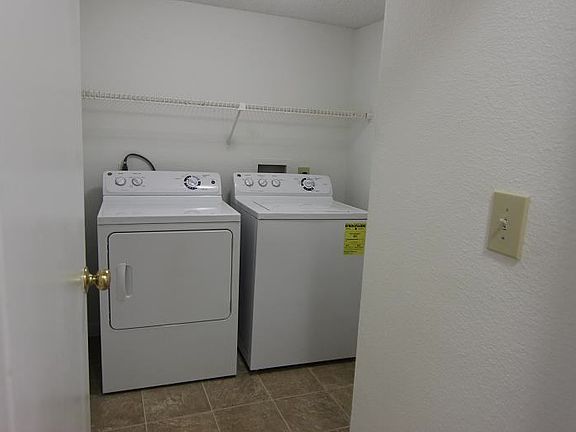 The Large Laundry Room Comes WITH a Washer & Dryer