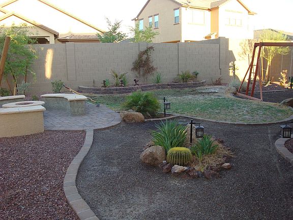 Large and beautiful backyard with firepit and playground