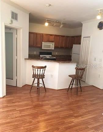 5th image of 6115 Metrowest Blvd Unit 102