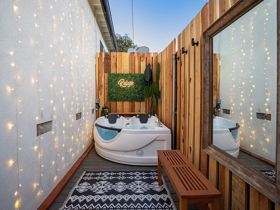 Come relax in our outdoor spa tub.