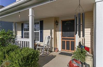 Enjoy evenings on this great covered front porch