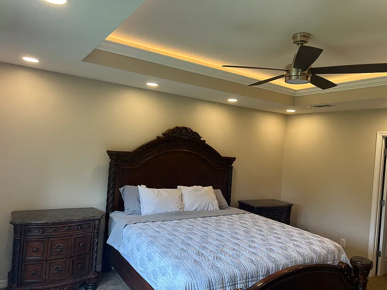 Owner Suite Bedroom with recess, lighting, as well as a coffered lighting in the Crawford ceiling