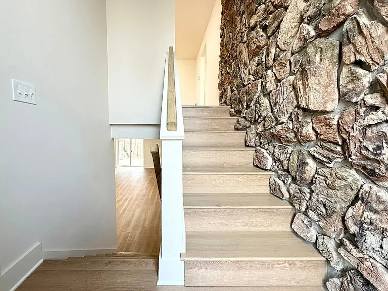 Just inside door / Stair landing to Upstairs living are or downstairs den.