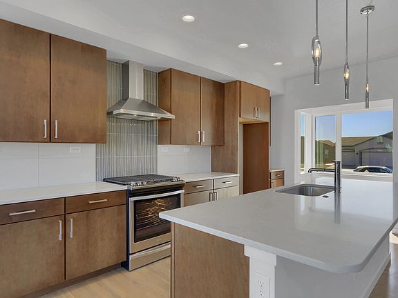 Contemporary and functional gourmet kitchen with a clean sleek look
