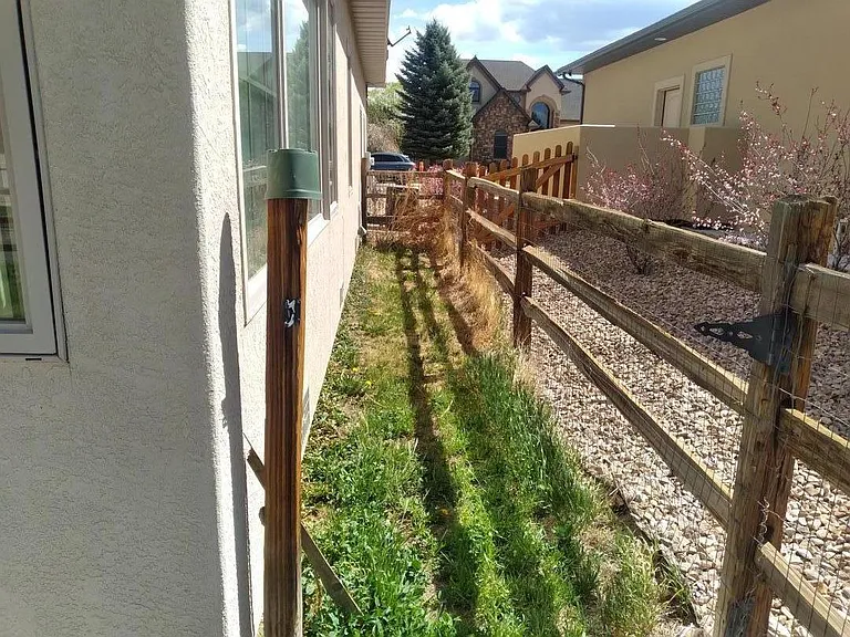 Back yard Dog Run. Doggie Door leading from Garage to Dog Run.