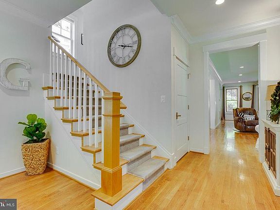 Foyer with Hardwood Floors Throughout