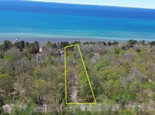 404 S Golden Beach Dr, Kewadin, MI 49648