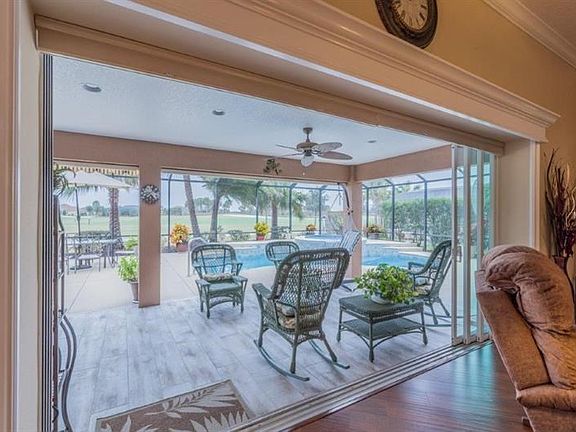 Beautiful Cornice Surrounds the Stacked Doors Leading to Your Beautiful Porcelain Tiled Lanai !