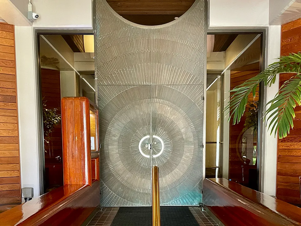 Artistic front entrance next to main office and 24/7 security