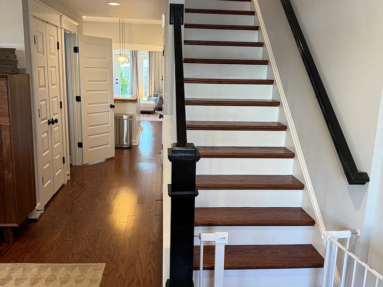 Two downstairs closets (coat and utility) and one half bath
