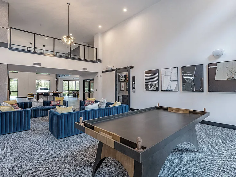 Clubhouse with TVs, Shuffleboard and Air Hockey