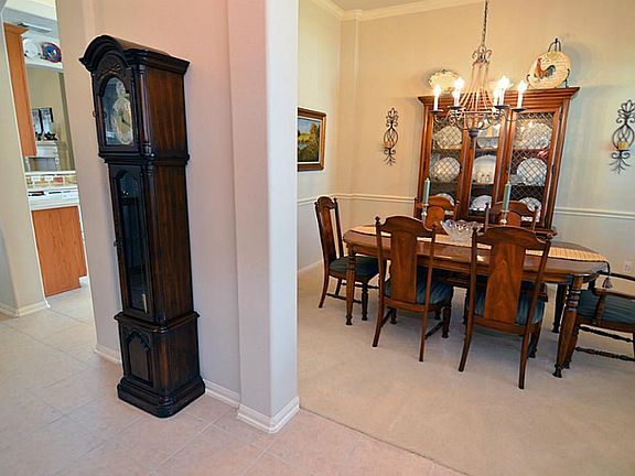Entry to the home is a wonderful foyer with entry to the formal dining