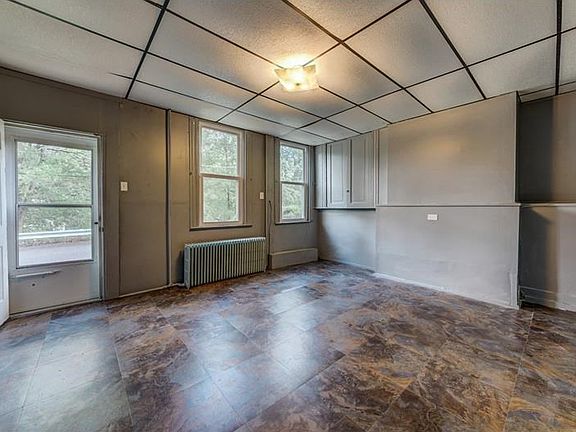 Above grade basement could be 3rd bedroom or play room